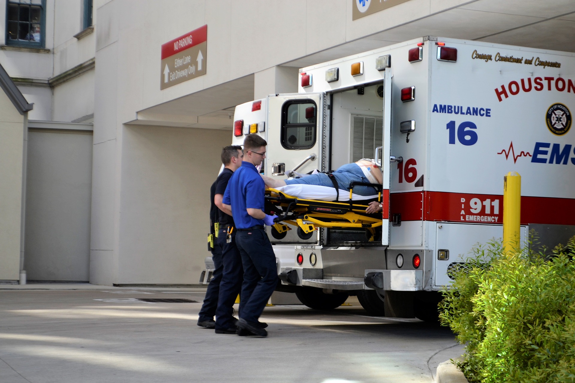 Man being loaded into an ambulance