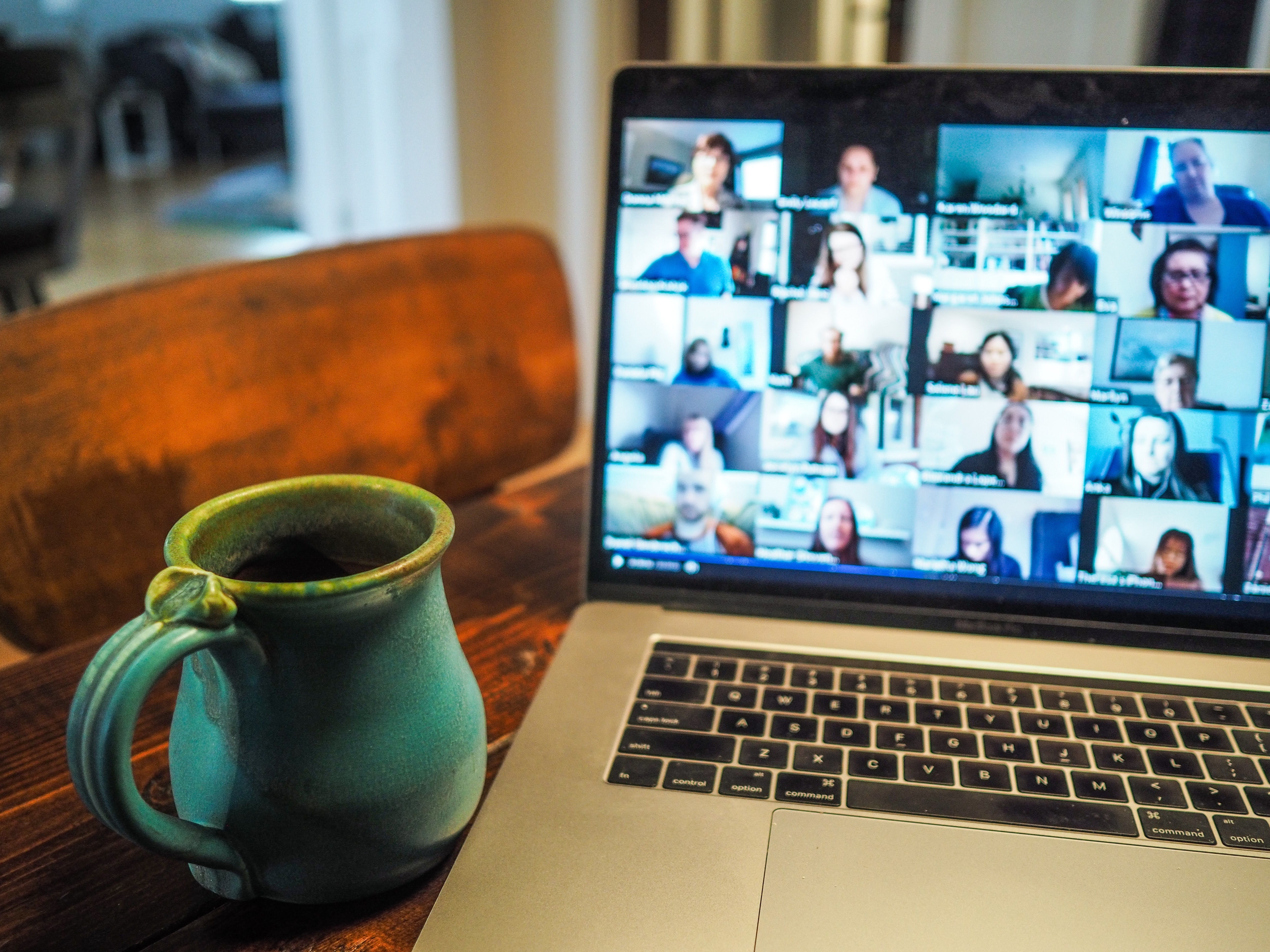 laptop screen showing group of people